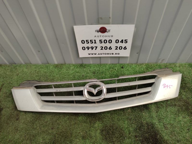 решетка радиатора - Mazda Demio